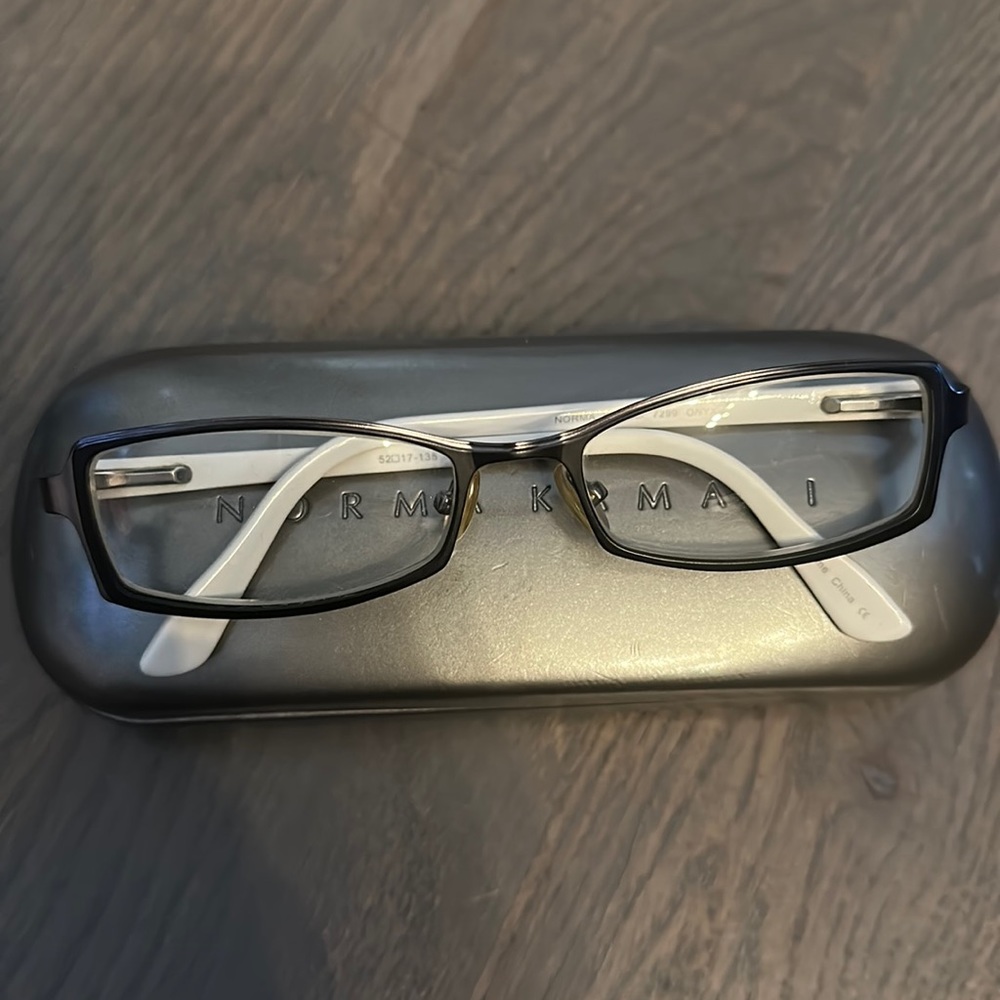 Norma Kamala prescription glasses. Two tone white and black